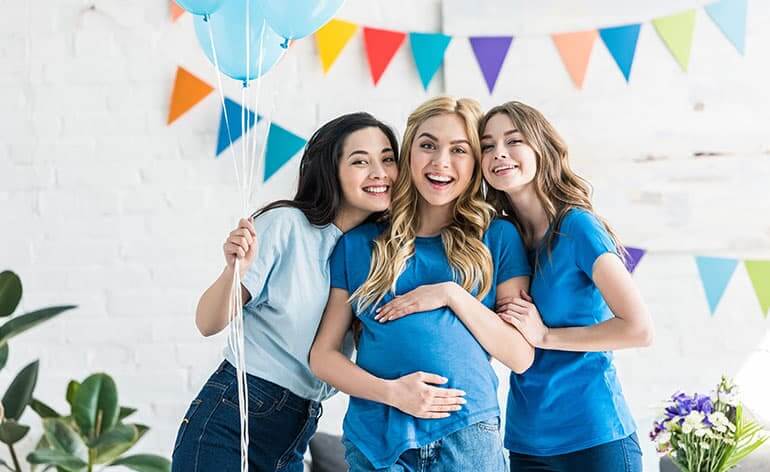 women celebrating at baby shower