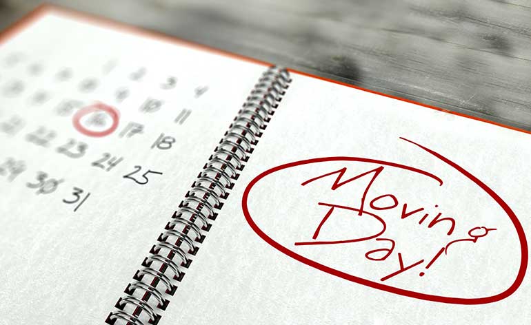 moving day written on the calendar
