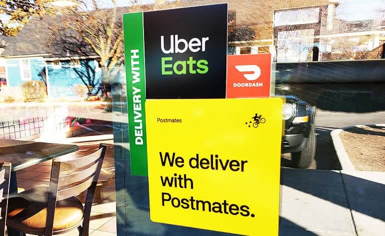 food delivery sign on restaurant
